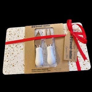 Marble three-piece cheese, set by bread and butter, white marble gold flecks